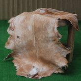 Elegant Brown and White Goat Hide Rug - Perfect Accent for Living Room or Bedroom