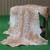 Rustic Brown and White Goat Skin Rug - Unique Pattern for Modern and Classic Décor