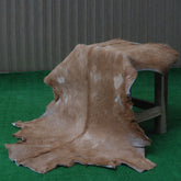 Luxurious Brown and White Goat Hide Rug - Natural Hair-On Leather for Home Styling