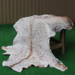 Rustic Brown and White Goat Skin Rug - Unique Pattern for Modern and Classic Décor
