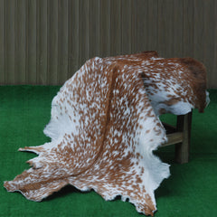 Handcrafted Brown and White Goat Skin Rug - Soft, Durable, and Elegant Décor