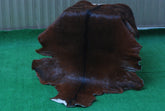 Luxurious Dark Brown Goat Skin Rug - Genuine Hair-On Leather for Elegant Décor