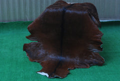 Luxurious Dark Brown Goat Skin Rug - Genuine Hair-On Leather for Elegant Décor