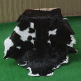 Elegant Black and White Goat Hide Rug - Perfect Accent for Any Room