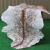 Authentic Hair-On Goat Skin Rug - Brown and White Pattern for Stylish Interiors