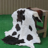 Rustic Black and White Goat Hide Rug - Perfect for Floor or Wall Décor