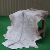 Luxurious Brown and White Goat Hide Rug - Natural Hair-On Leather for Home Styling