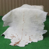 Authentic Hair-On Goat Skin Rug - Brown and White Pattern for Stylish Interiors