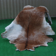 Handcrafted Dark Brown Goat Hide Rug - Soft, Natural Leather for Home Décor