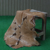 Luxurious Brown and White Goat Hide Rug - Natural Hair-On Leather for Home Styling