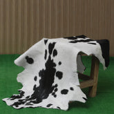 Stylish Black and White Goat Hide Rug - Unique Natural Pattern for Modern Homes