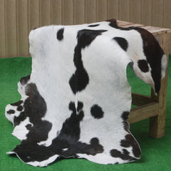 Rustic Black and White Goat Hide Rug - Perfect for Floor or Wall Décor
