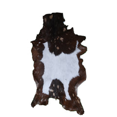 Decorative Brown and White Goat Hide Rug - Perfect for Floor or Wall Accents
