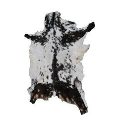 Decorative Black and White Goat Skin Rug - Genuine Leather for Sophisticated Spaces