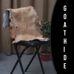 Elegant Brown and White Goat Hide Rug - Perfect Accent for Living Room or Bedroom