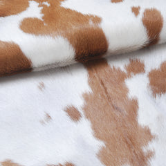 Natural Brown and White Goat Hide Rug - Luxurious Accent for Modern Homes
