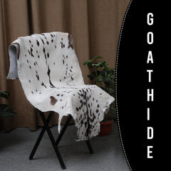 Rustic Black and White Goat Hide Rug - Perfect for Floor or Wall Décor