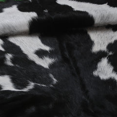 Natural Black and White Goat Hide Rug - Luxurious and Stylish Floor Accent