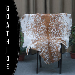 Handcrafted Brown and White Goat Skin Rug - Soft, Durable, and Elegant Décor