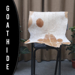 Elegant Brown and White Goat Hide Rug - Perfect Accent for Living Room or Bedroom
