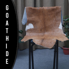 Elegant Brown and White Goat Hide Rug - Perfect Accent for Living Room or Bedroom