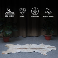 Handcrafted Brown and White Goat Skin Rug - Soft, Durable, and Elegant Décor