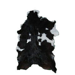 Elegant Black and White Goat Hide Rug - Perfect Accent for Any Room