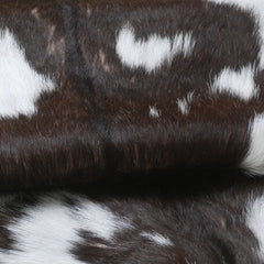 Luxurious Brown and White Goat Hide Rug - Premium Hair-On Rug with Unique Patterns and Non-Slip Suede Back - Sustainable and Eco-Friendly