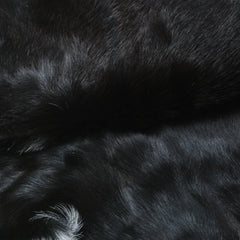 Elegant Black and White Goat Hide Rug - Perfect Accent for Any Room