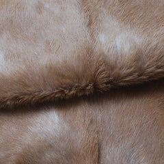 Luxurious Brown and White Goat Hide Rug - Natural Hair-On Leather for Home Styling