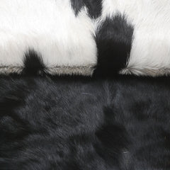 Luxurious Handmade Black & White Goat Skin Rug: Soft, Hypoallergenic, Sustainable, Non-Shedding & Unique - Add Nature's Beauty to Your Home - Celestial Leather Limited