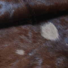 Natural Dark Brown Goat Hide Rug - Perfect for Modern and Rustic Spaces