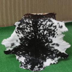 Modern Sophistication: Genuine Black and White Goat Skin Throw Rug for Home Decor - Non-Slippery Back, Hypoallergenic, and Unique Natural