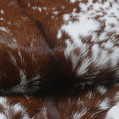 Goat Skin Rug: Brown and white genuine Goat hide rug - Celestial Leather Limited