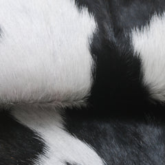Rustic Black and White Goat Hide Rug - Perfect for Floor or Wall Décor