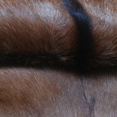 Luxurious Brown and Black Goat Hide Rug with Unique Patterns and Non-Slip Suede Back - Sustainable Eco-Friendly Accent Piece - Celestial Leather Limited