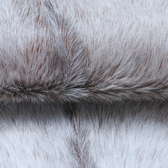 Luxurious Brown and White Goat Hide Rug - Natural Hair-On Leather for Home Styling