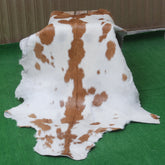 Natural Brown and White Goat Hide Rug - Luxurious Accent for Modern Homes