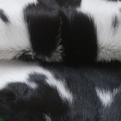 Elegant Black and White Goat Hide Rug - Perfect Accent for Any Room