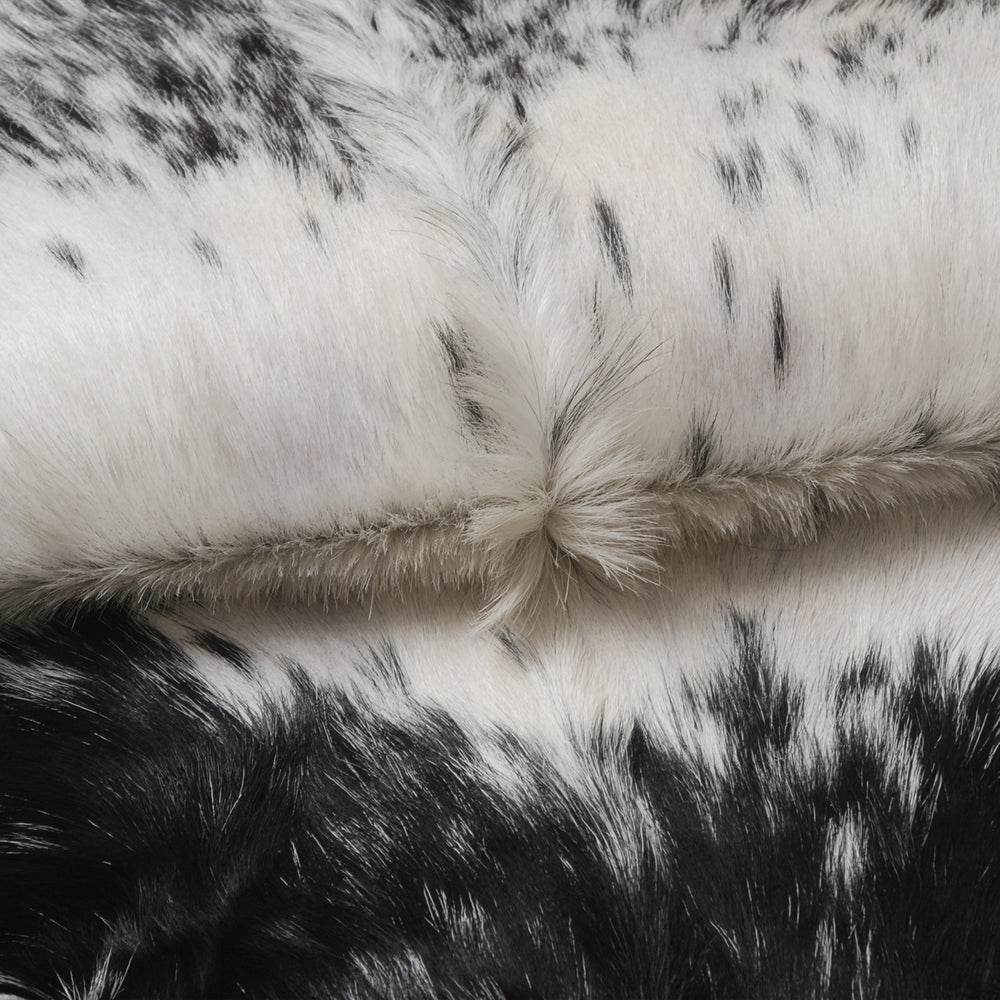 Luxurious Black & White Goat Skin Rug Perfect for Modern Spaces - Celestial Leather Limited