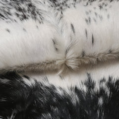Luxurious Black & White Goat Skin Rug Perfect for Modern Spaces - Celestial Leather Limited