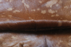 Authentic Hair-On Goat Skin Rug - Brown and White Pattern for Stylish Interiors