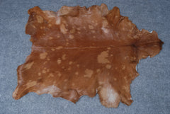 Authentic Hair-On Goat Skin Rug - Brown and White Pattern for Stylish Interiors