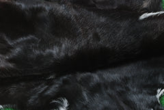 Elegant Black and White Goat Hide Rug - Perfect Accent for Any Room