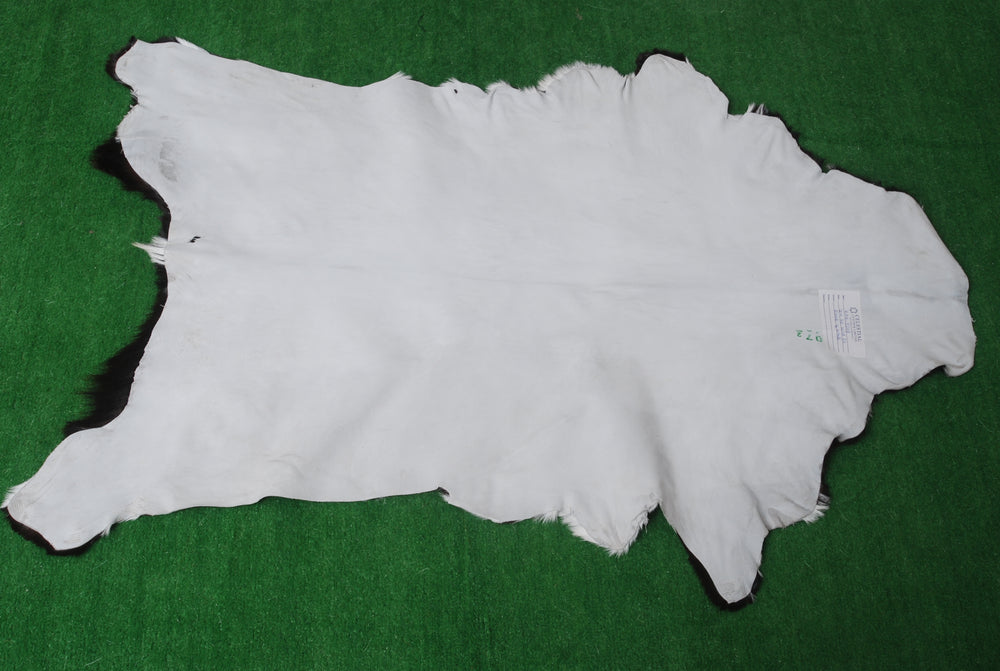 Sophisticated Black & White Genuine Goat Skin Rug - Modern Animal Hide Décor for Home - Hypoallergenic, Sustainable, Unique Pattern - Celestial Leather Limited