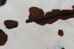 Luxury Handmade Dark Brown White Goat Skin Rug with Non-Slip Suede Backing - Eco-Friendly Natural Beauty for High-Traffic Areas - Celestial Leather Limited