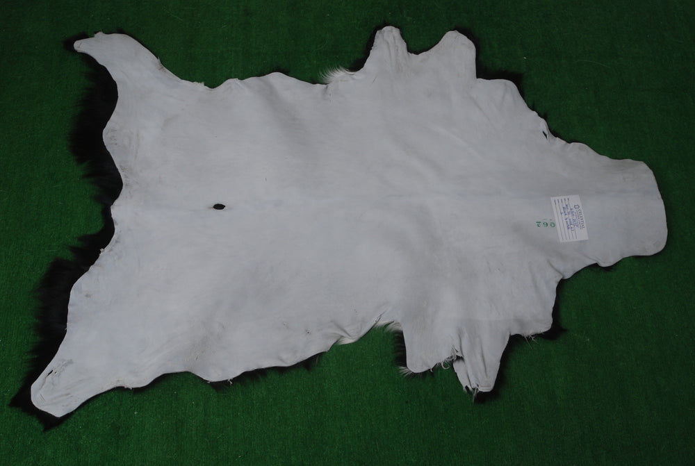 Modern Sophistication: Genuine Black & White Goat Skin Throw Rug - Hypoallergenic - Eco-Friendly - Unique Animal Skin Goathide - Non-Slip - Celestial Leather Limited