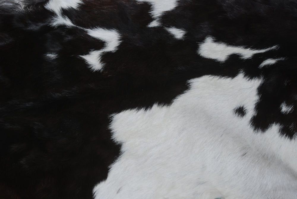 Luxurious Black and White Goat Skin Rug - Modern Home Décor - Celestial Leather Limited