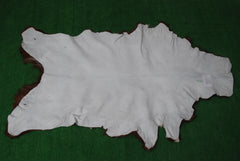 Luxurious Brown and White Goat Hide Rug - Premium Handcrafted Hair-On Goatskin Rug for Elegant Home Decor - Celestial Leather Limited