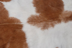 Luxury Brown and White Natural Goat Skin Rug with Modern Graphic Pattern for Stylish Wall Décor - Hypoallergenic and Non-Shedding,